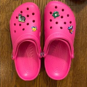 Never worn pink crocs with or without gibets!!